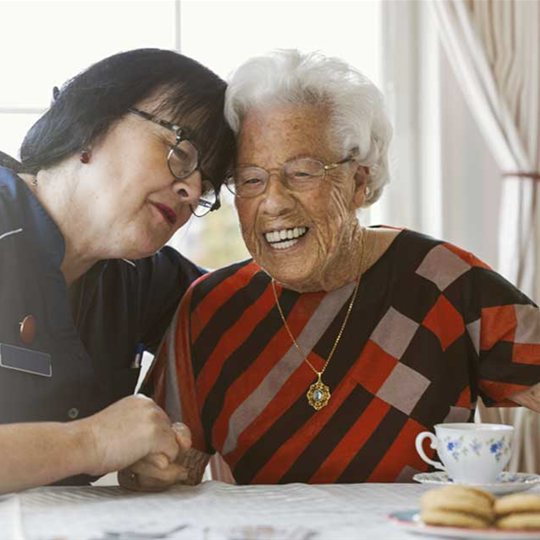 Elderly woman with nurse